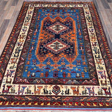 Load image into Gallery viewer, Ersari Kazak wool rug displayed on hardwood floor — Classic World Rugs Cwral-11649
