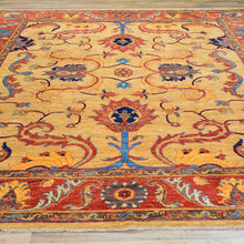 Load image into Gallery viewer, Decorative rug with intricate patterns on a wooden floor