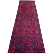 Load image into Gallery viewer, Red patterned rug on a white background