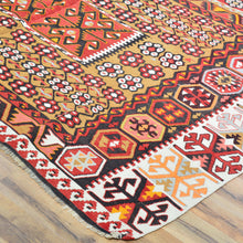 Load image into Gallery viewer, Colorful patterned rug on a wooden floor