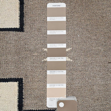 Load image into Gallery viewer, Pantone color swatches on a textured surface with geometric pattern