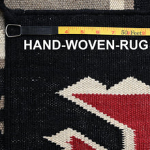 Load image into Gallery viewer, Hand-woven rug with a measuring tape indicating its dimensions