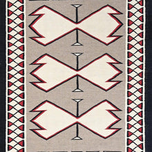Load image into Gallery viewer, Patterned rug with geometric design featuring red, white, and black on a beige background.