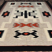 Load image into Gallery viewer, Patterned rug with geometric design on a wooden floor