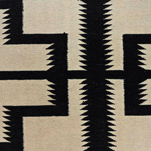 Load image into Gallery viewer, Close-up of a geometric pattern with black and beige colors
