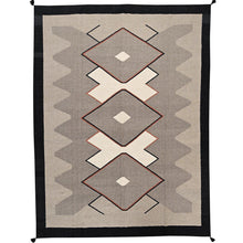 Load image into Gallery viewer, Geometric patterned rug with brown, beige, and black design on a plain background