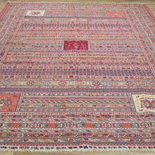 Load image into Gallery viewer, Large patterned rug with intricate designs on a wooden floor.