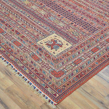 Load image into Gallery viewer, Decorative rug with intricate patterns on a wooden floor