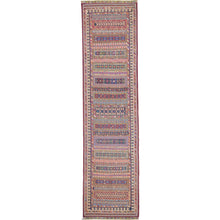 Load image into Gallery viewer, Long, narrow patterned rug on a white background