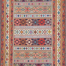 Load image into Gallery viewer, Colorful patterned rug with geometric designs