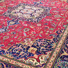Load image into Gallery viewer, Side view of Vintage Persian hand-knotted rug 10x13, showing pile depth and wool texture — Classic World Rugs Albuquerque NM
