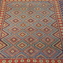 Load image into Gallery viewer, Reversible Soumak wool rug styled in living room, red tribal geometric – Classic World Rugs